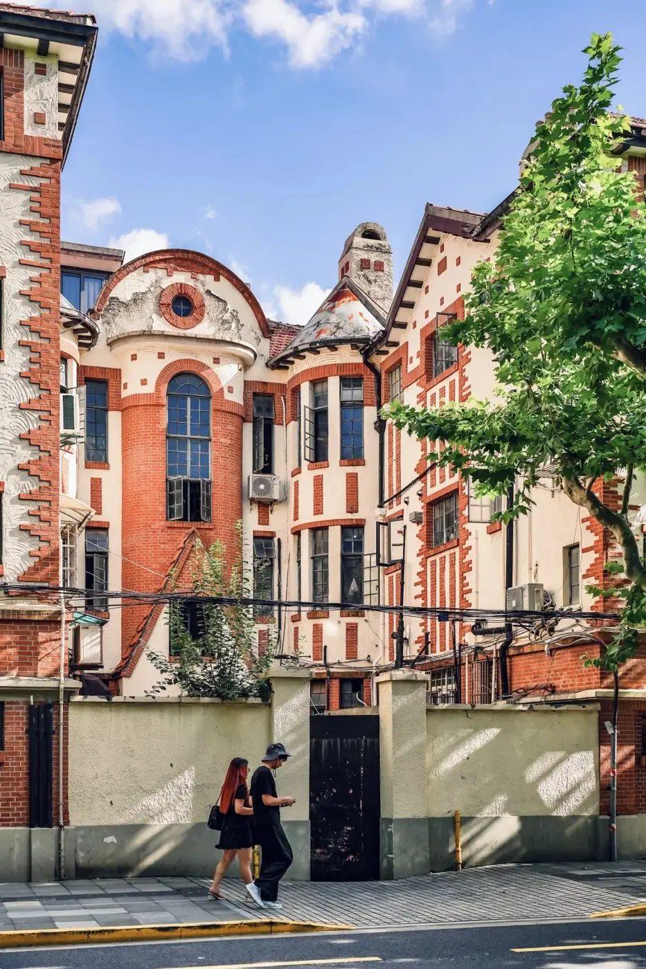 Historic red-brick building on plane-tree-lined Fuxing Middle Road, Shanghai