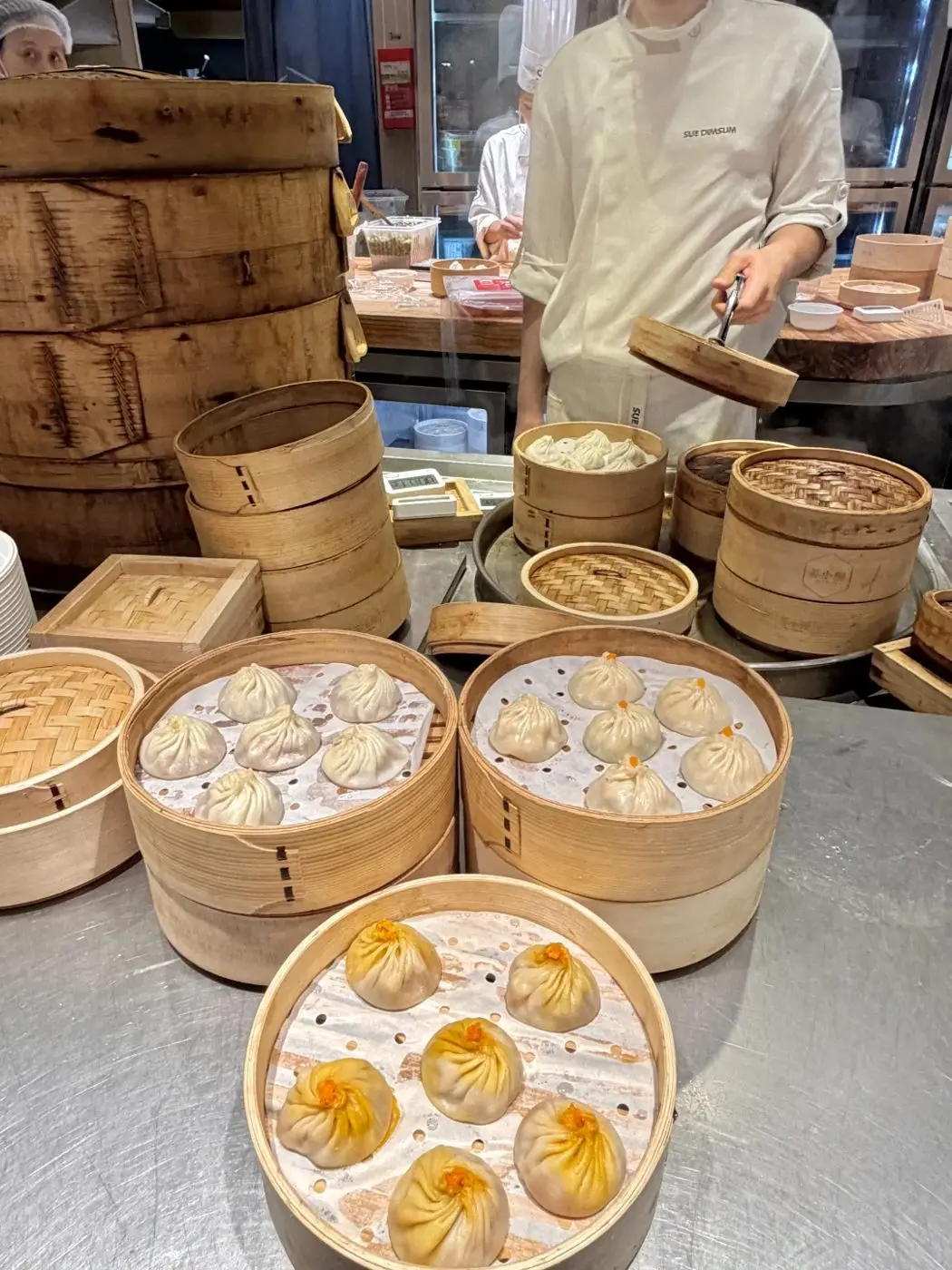 Stacked bamboo steamers of xiaolongbao soup dumplings in Shanghai
